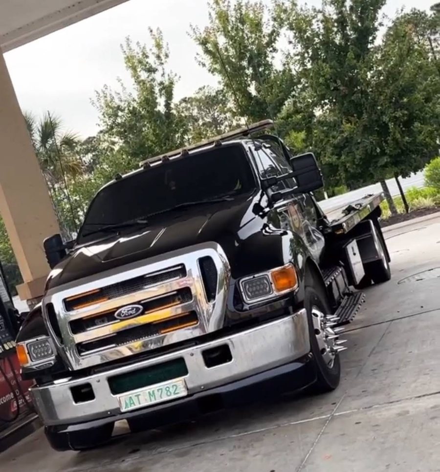 Yayi’s Towing Ford F-650 flatbed tow truck